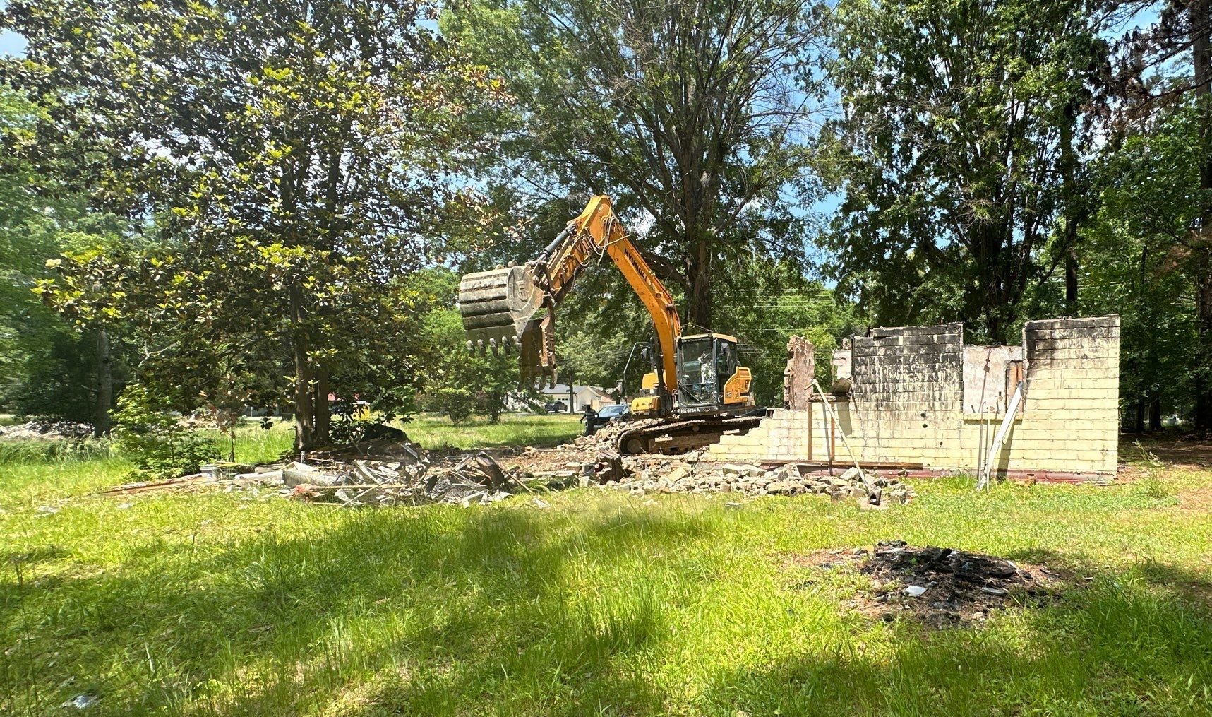 CapCon demolition equipment clearing a construction site