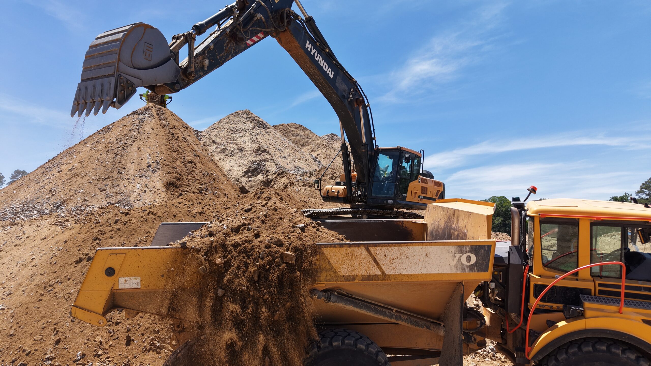 Equipment operator working on CapCon project