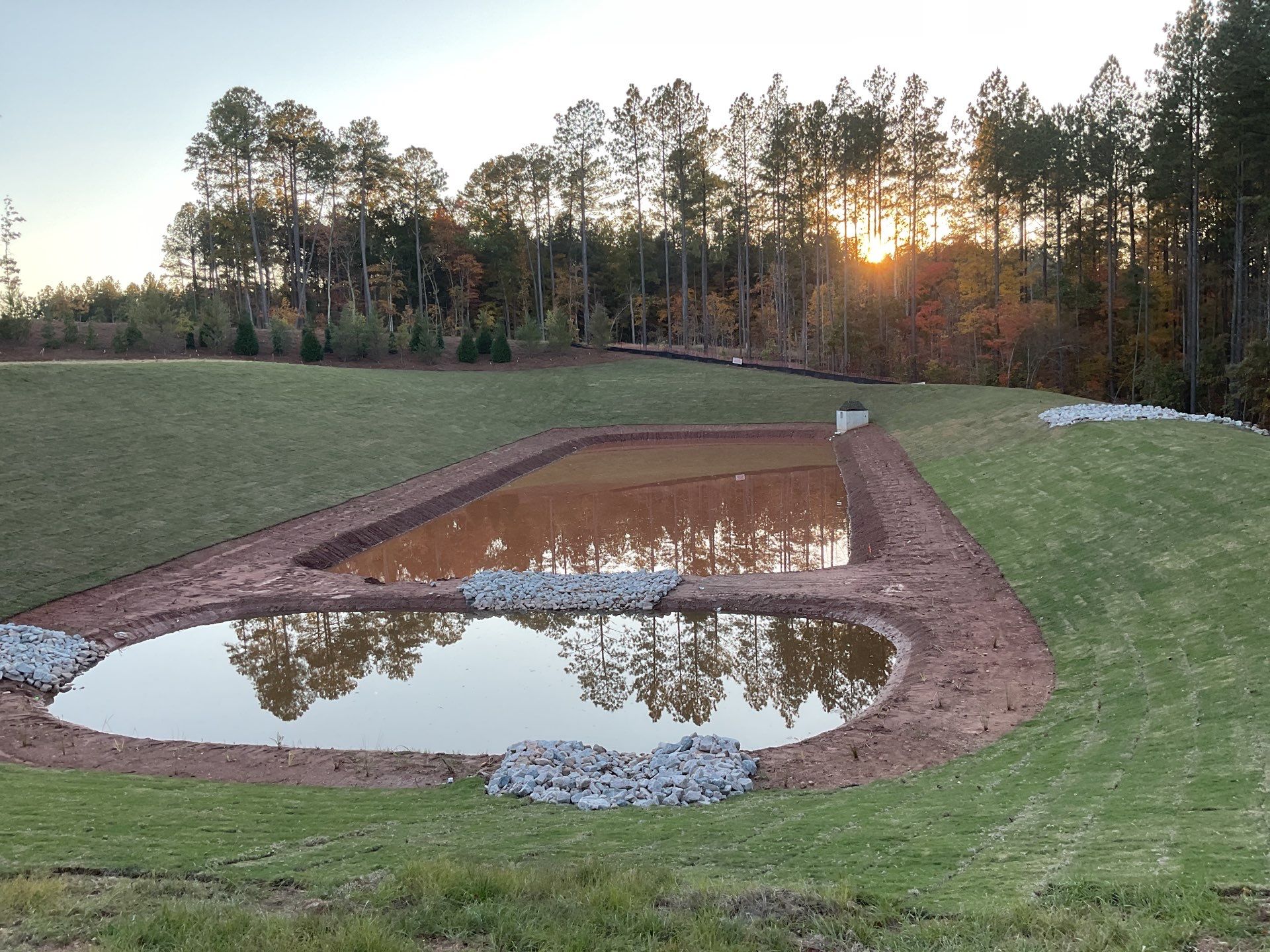 Pond stabilization and erosion control work